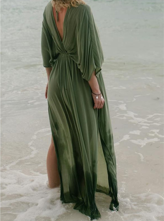 Woman in summer dress near sea
